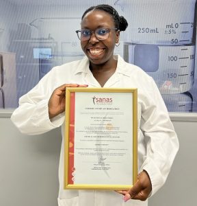 WearCheck Water laboratory assistant, Khensani Mbuli, pictured with the company’s latest accreditation certificate or microbiological testing. Mbuli is WearCheck Water’s newest technical signatory – a significant professional milestone in the field of laboratory testing and calibration.