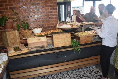 Guests enjoying the breakfast buffet provided by the Italian Club.