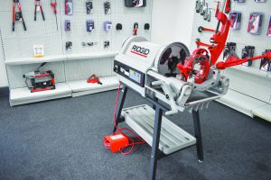 A pipe threading machine, by RIDGID Tools.